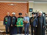 حضور سفیران کریمه اهل‌بیت (سلام‌الله علیها) همراه با پرچم متبرک حرم حضرت معصومه (س) در جمع دانشگاهیان